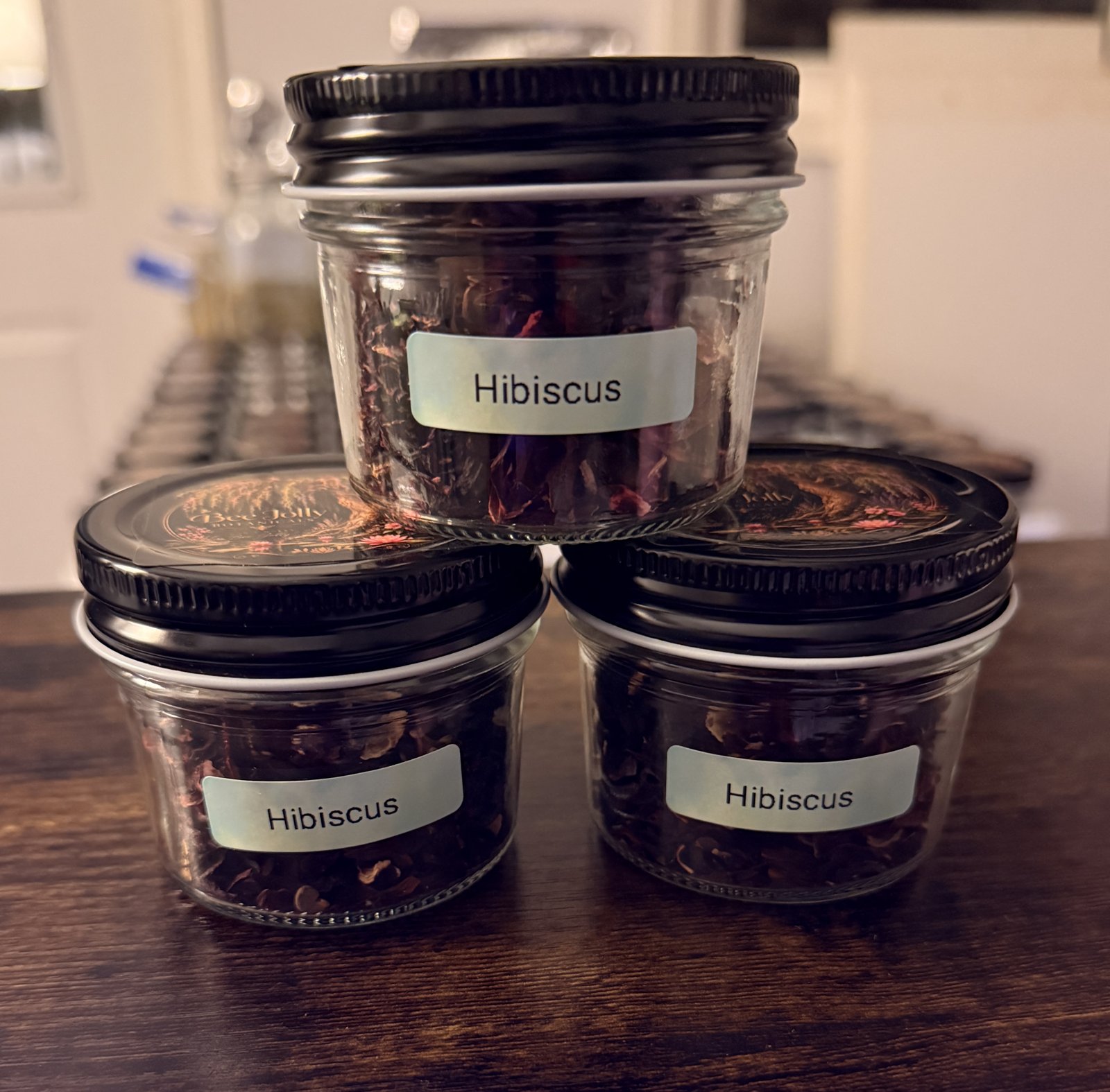 Dried Hibiscus in a Bee Jolly Botanicals jar